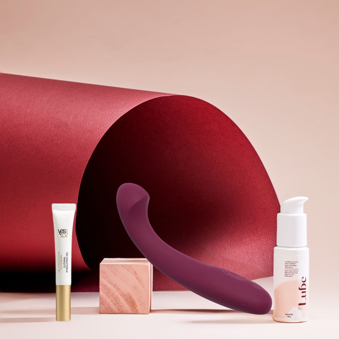 Photo de l'Arc, de Dame, un sextoy vibro point G, couleur Bordeau, pour une stimulation interne main coffret